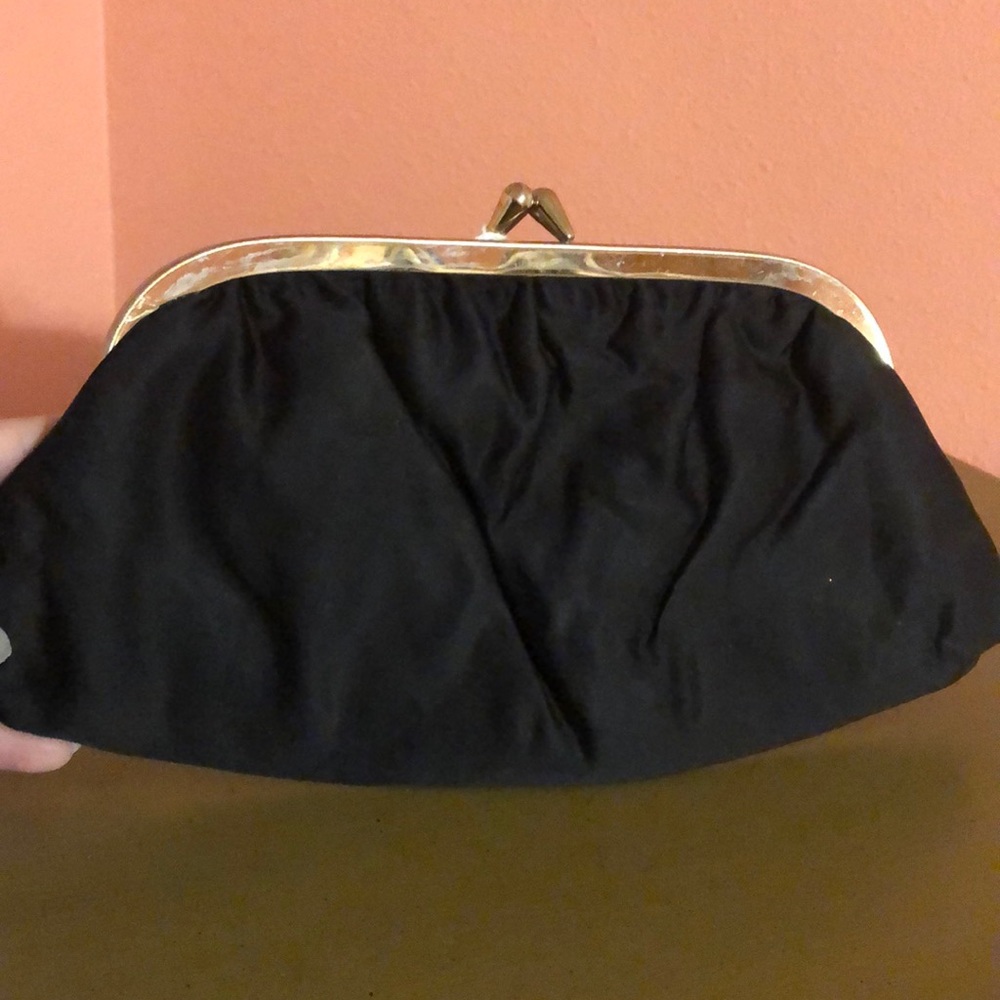 Black clutch with gold clasp